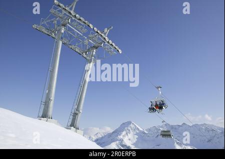 Skiers in chair lift, Kuhtai, Tyrol, Austria Stock Photo