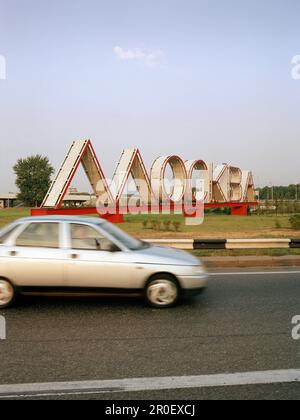 Moscow neon sign, Varshavskoye shosse at city border of Moscow, Russia Stock Photo