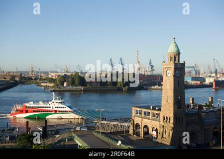 View over Landungsbruecken to dockyard with cranes, St. Pauli, Hamburg, Germany Stock Photo