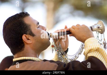 Turkish middle-aged man playing Zurna with silver decorations, Türkei Stock Photo
