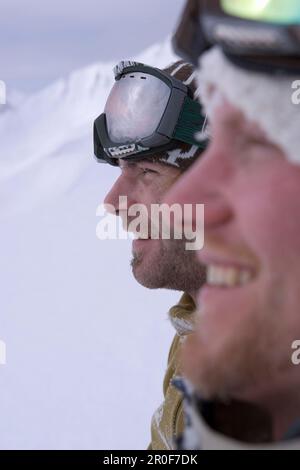 Two young men side by side, Kuehtai, Tyrol, Austria Stock Photo