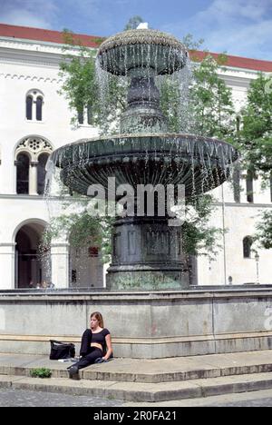 fountain, geschwister scholl platz, munich, bavaria, germany Stock Photo
