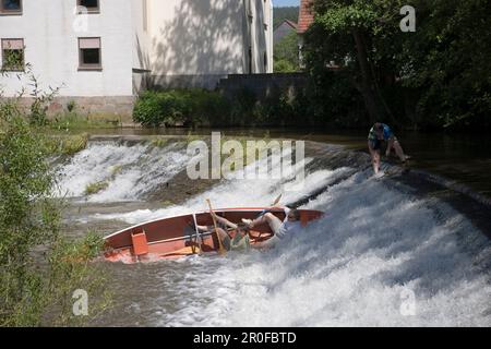 Capsizing Canoe on River Haune Weir, Haunetal-Neukirchen, Rhoen, Hesse, Germany Stock Photo