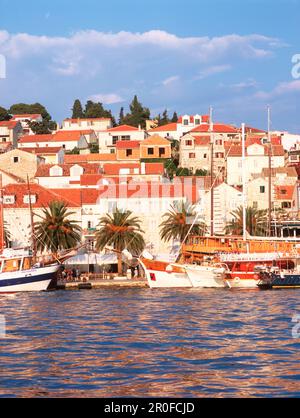 View over Adriatis Sea to promenade of Hvar, Hvar, Dalmatia, Croatia Stock Photo