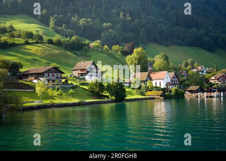 View over Lake Lucerne to village, Kehrsiten Dorf, Canton of Lucerne, Switzerland Stock Photo