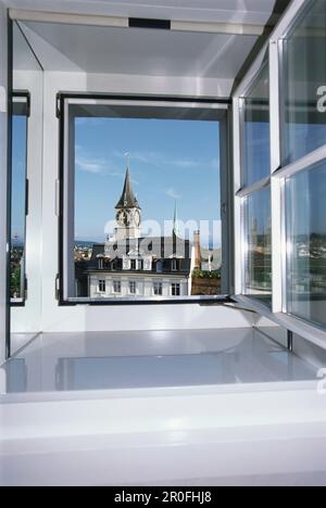 View through a window to Old Town with St. Peter church, Zurich, Canton of Zurich, Switzerland Stock Photo