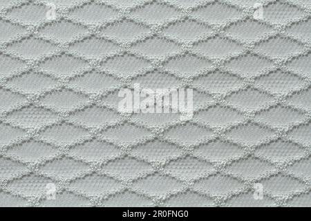 Seamless texture of polyester lace fabric in white color. Macro. Texture. Closeup Stock Photo