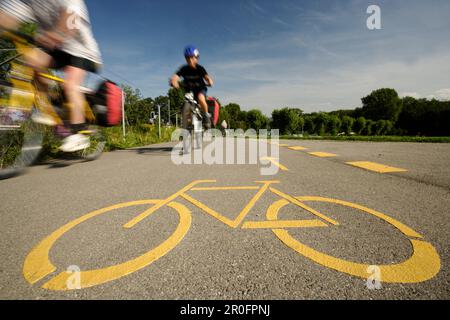 Cyclists passing bikeway, Romanshorn, Canton of Thurgau, Switzerland Stock Photo