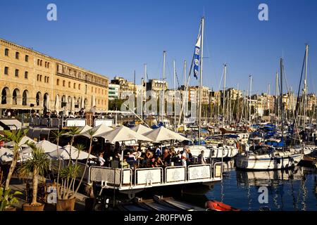 Barcelona,Port Vell,Bar terasse on deck of a boat in front of,Museu d Historia de Catalunya Stock Photo