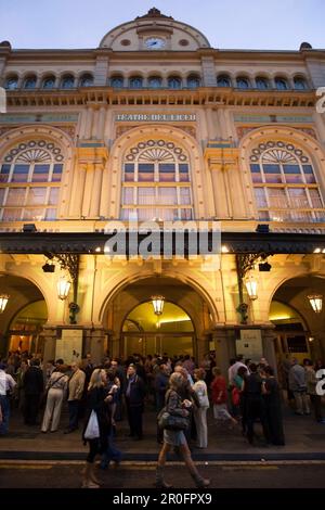 Spain,Barcelona,Ramblas,opera house,people,facade,illuminated at night Stock Photo