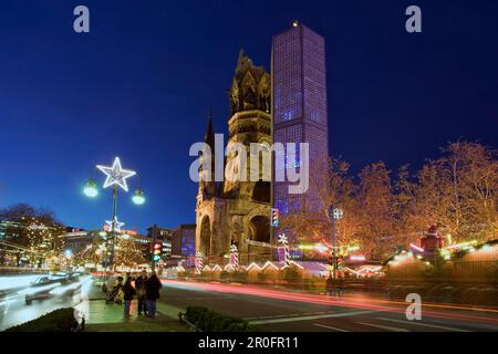 Berlin,christmas market, Kaiser Wilhelm memory church, christmas market  lights at dusk Stock Photo