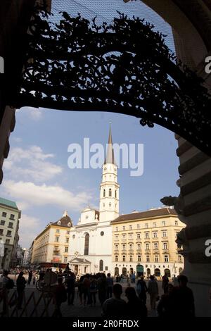 Vienna Hofburg wrought iron gate background Michaeler church Stock Photo