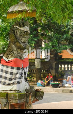 Stone figure with umbrella at Puputan Square, Denpasar, Bali, Indonesia, Asia Stock Photo