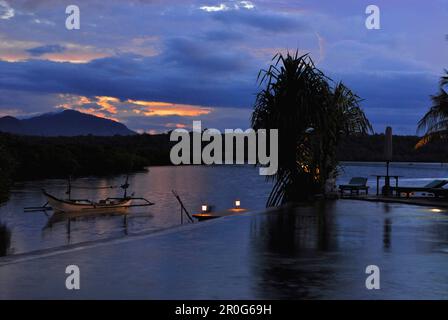 Deserted pool at Mimpi Resort in the evening, Menjangan, West Bali National Park, Indonesia, Asia Stock Photo