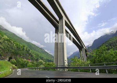 Road passing beneath the motorway bridge, Gotthard highway near Giornico, valley Leventina, Ticino, Switzerland Stock Photo