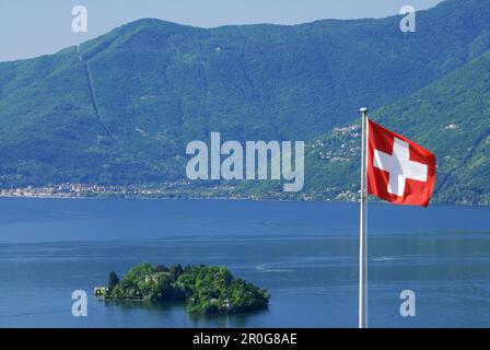 Flag of Switzerland in front of isle of Brissago, Isole di Brissago, in lake Maggiore, lake Maggiore, Lago Maggiore, Ticino, Switzerland Stock Photo