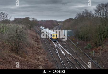 Northern Rail class 769 flex bi mode train 769448  passing  Crow nest Junction (Hindley) while running on diesel power Stock Photo