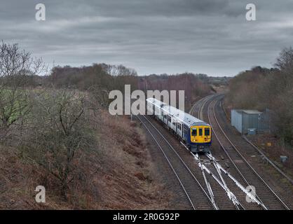 Northern Rail class 769 flex bi mode train 769448  passing  Crow nest Junction (Hindley) while running on diesel power Stock Photo