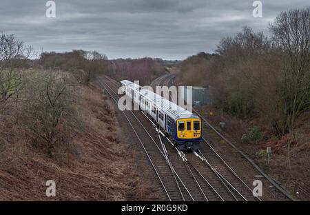 Northern Rail class 769 flex bi mode train 769448  passing  Crow nest Junction (Hindley) while running on diesel power Stock Photo