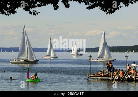 Sailing boats on lake Starnberg, Seeshaupt, Bavaria, Germany Stock Photo