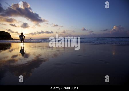 Surfer at beach, Istmo de la Pared, Fuerteventura, Spain Stock Photo