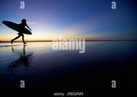 Surfer at beach, Istmo de la Pared, Fuerteventura, Spain Stock Photo