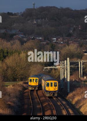 2 Northern Rail class 769 flex bi mode trains passing at Lostock junction, the end of the electrified section while running on diesel. Stock Photo