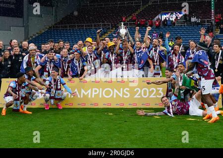 Burnley, UK. 08th May, 2023. Burnley players celebrate with the Championship Trophy after the Sky Bet Championship match Burnley vs Cardiff City at Turf Moor, Burnley, United Kingdom, 8th May 2023 (Photo by Steve Flynn/News Images) in Burnley, United Kingdom on 5/8/2023. (Photo by Steve Flynn/News Images/Sipa USA) Credit: Sipa USA/Alamy Live News Stock Photo