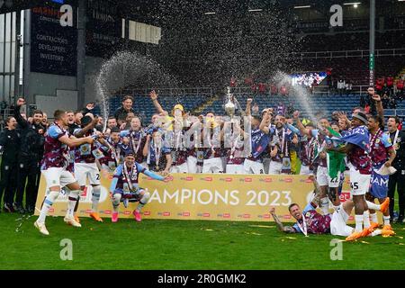 Burnley, UK. 08th May, 2023. Burnley players celebrate with the Championship Trophy after the Sky Bet Championship match Burnley vs Cardiff City at Turf Moor, Burnley, United Kingdom, 8th May 2023 (Photo by Steve Flynn/News Images) in Burnley, United Kingdom on 5/8/2023. (Photo by Steve Flynn/News Images/Sipa USA) Credit: Sipa USA/Alamy Live News Stock Photo