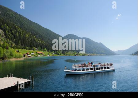 Excursion boat landing at stage, lake Weissensee, Carinthia, Austria, Europe Stock Photo