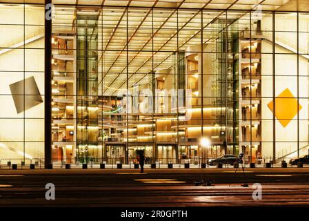 Illuminated glass facade of the Paul-Loebe House, Place of the Republic, District Zoo, Berlin, Germany, Europe Stock Photo