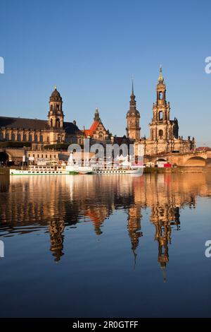 View over the Elbe river to Bruehlsche Terrasse, Staendehaus, Dresden castle and church Hofkirche in the evening light, Dresden, Saxonia, Germany Stock Photo