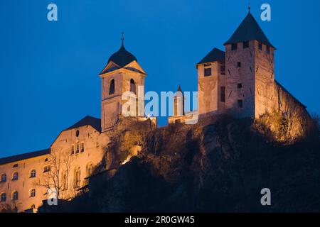 The illuminated Saeben monastery in the evening, Valle Isarco, Alto Adige, South Tyrol, Italy, Europe Stock Photo