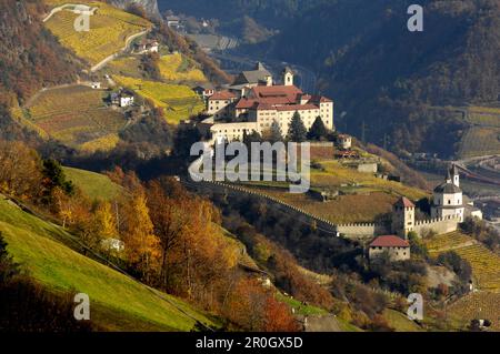 View of Saeben monastery in autumn, Chiusa, Valle Isarco, South Tyrol, Italy, Europe Stock Photo