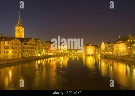 View on Limmat and St Peter at dusk, Zurich, Switzerland Stock Photo