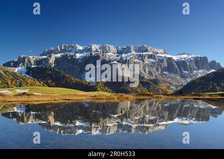 Sella range reflecting in a mountain lake, Val Gardena, Dolomites, UNESCO World Heritage Site Dolomites, South Tyrol, Italy Stock Photo