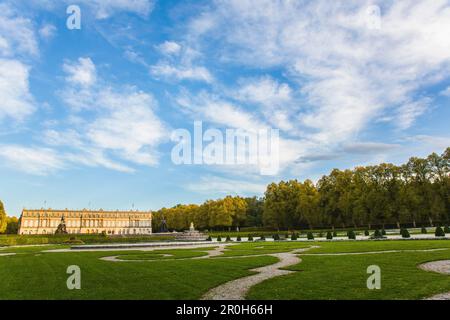 Castle Herrenchiemsee in the evening light with blue-white sky, castle park, autumn, Prien on the Chiemsee, Herreninsel, Chiemsee, Bavaria, Germany Stock Photo