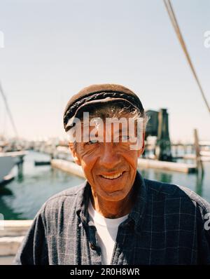 USA, Rhode island, Newport, close-up of a happy senior man looking away. Stock Photo