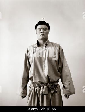 MONGOLIA, Ulaanbaatar, portrait of a Mongolian wrestlers in traditional dress at the Olympic school facility (B&W) Stock Photo