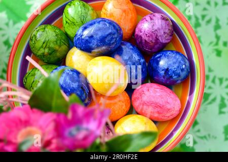 bowl with collected Easter eggs, Germany Stock Photo