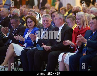 Bucharest, Romania. 8th May, 2023: Senator Nicoleta Pauliuc (C-L), new president of the Liberal Women's Organization, Lucian Bode (C), Secretary General of National Liberal Party and Romanian Minister of the Interior, and Nicolae Ciuca (C-R), president of of National Liberal Party and Romanian Prime Minister, attend the Congress of Romanian Liberal Seniors, at the Palace of the Parliament. Credit: Lucian Alecu/Alamy Live News Stock Photo