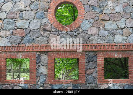 Natural stone wall of an old stable, Kroechlendorff castle, Kroechlendorff, Uckermark, Brandenburg, Germany Stock Photo