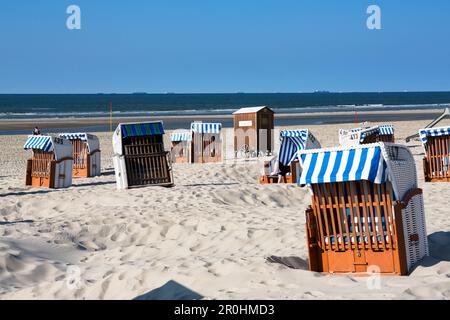 Beach chairs, Spiekeroog Island, North Sea, East Frisian Islands, East Frisia, Lower Saxony, Germany, Europe Stock Photo