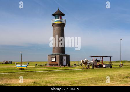 Lighthouse with horse and chart, Juist Island, Nationalpark, North Sea, East Frisian Islands, East Frisia, Lower Saxony, Germany, Europe Stock Photo