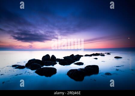 Stones in the morning light, Buelk, Strande, Kiel Fjord, Schleswig-Holstein, Germany Stock Photo