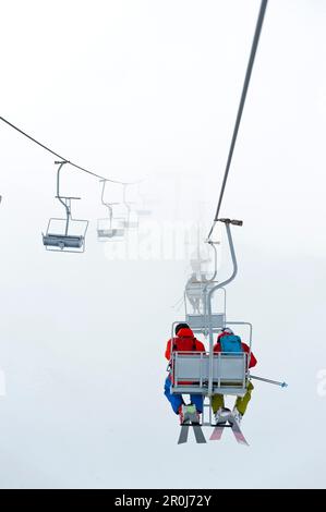 Chairlift in the fog, Nevados de Chillan, Bio-Bio Region, Chile Stock Photo