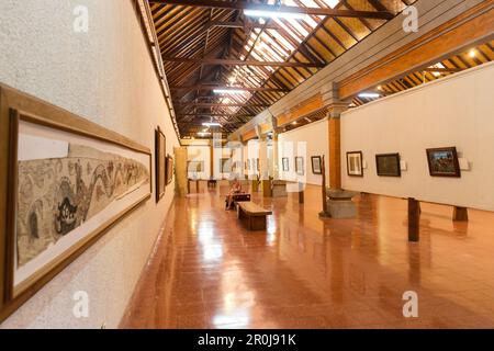 Exhibition of modern Balinese paintings, art museum Puri Lukisan, Ubud, Bali, Indonesia Stock Photo