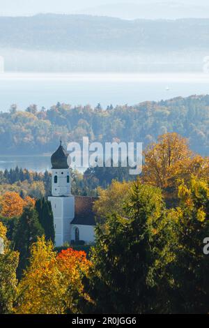 view from Ilkahoehe across Lake Starnberg to the alps, Autumn, chapel with onion shaped tower, near Tutzing, Starnberg five lakes region, Starnberg, B Stock Photo
