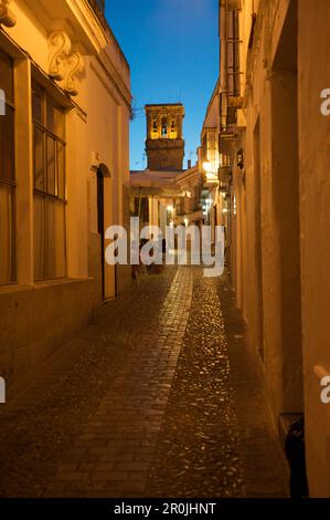 Cobblestone lane in the evening, Calle San Pedro, in the white town of Arcos de la Frontera, Cadiz province, Andalusia, Spain, Europe Stock Photo
