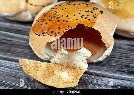 Egyptian Mahlab bread, puff thin, crispy and delicious with black seed baraka seeds on top, made of flour, dry yeast, milk, eggs, sugar, salt, black s Stock Photo